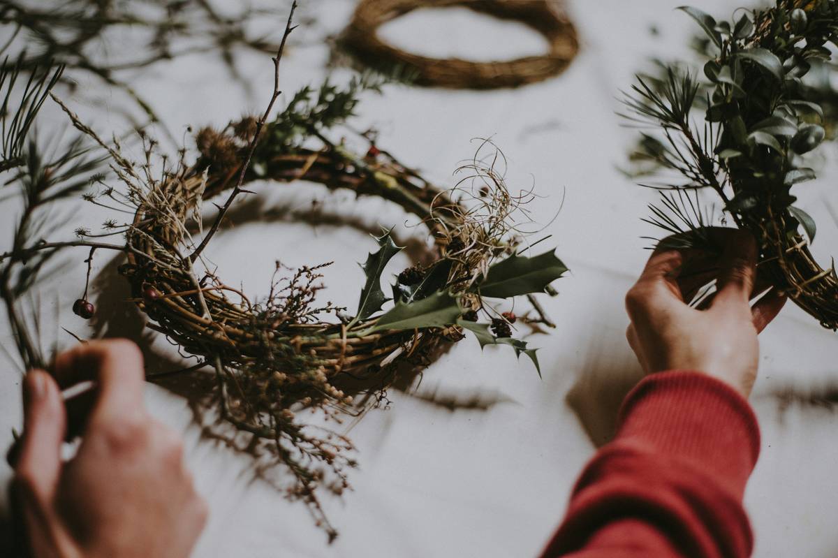 seasonal item wreath instruction on how to wrap floral wire around base for durability