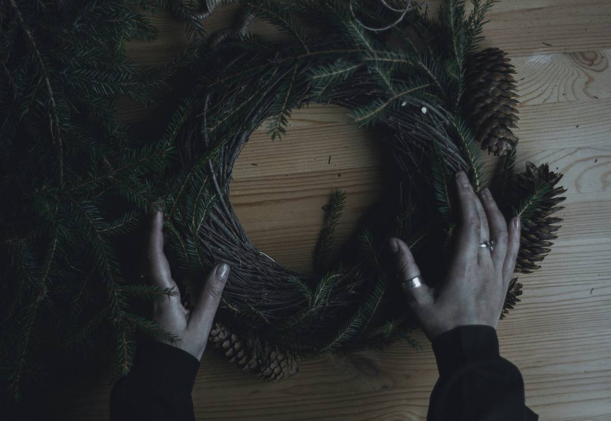 seasonal item wreath instruction on how finished wreath resists weather on front door